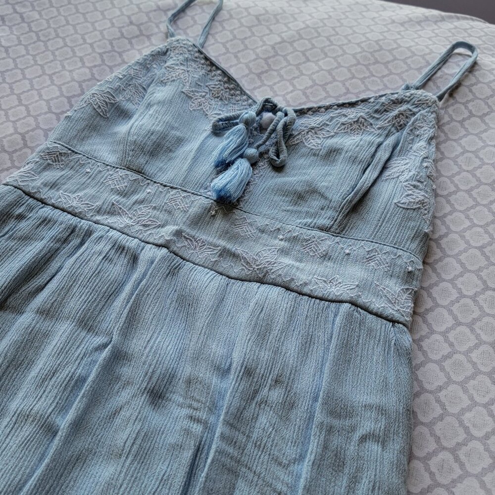 floor length light blue sleeveless dress